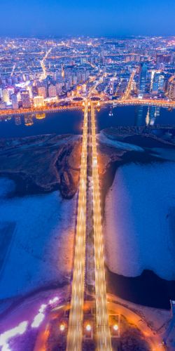 冬季公路大桥松花江城市航拍