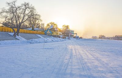 冬季松花江畔冰雪景观夕阳