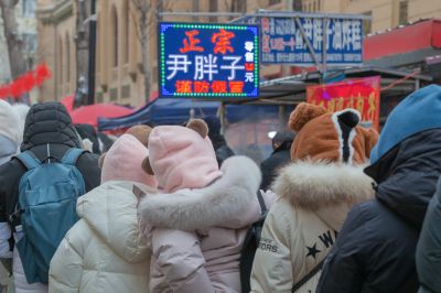 红专街早市的南方游客