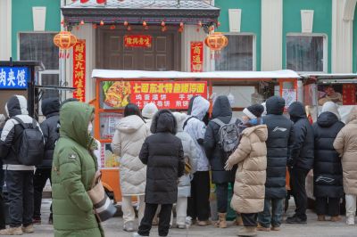 红专街早市的南方游客