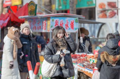 红专街早市的南方游客