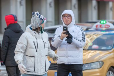 红专街早市的南方游客